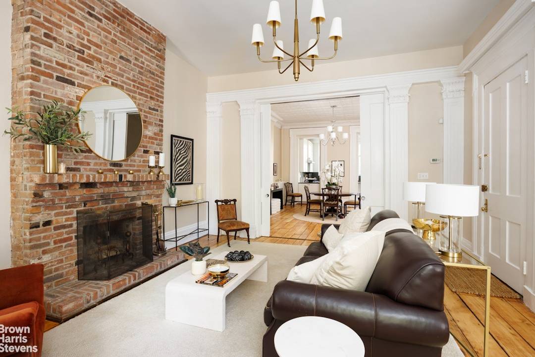 408 Henry Street is a 4 story, 2 family townhouse built circa 1852 in classic Greek revival style.