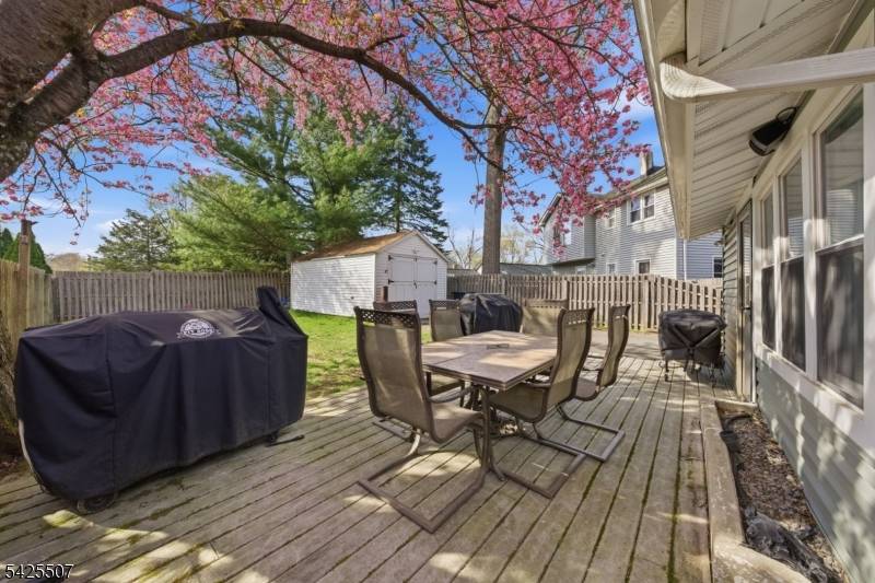 Charming Cape style home in the sought after Indian Lake community, offering the perfect blend of character, flexibility, and location.