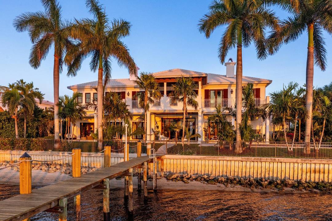 Stunning British Colonial estate in serene Point Manalapan.