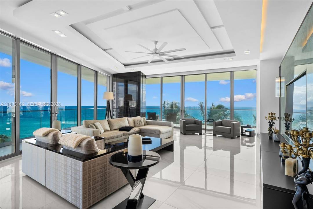 One of a kind, turnkey direct oceanfront residence curated and furnished by the world renowned Armani Design Team, following a 1.