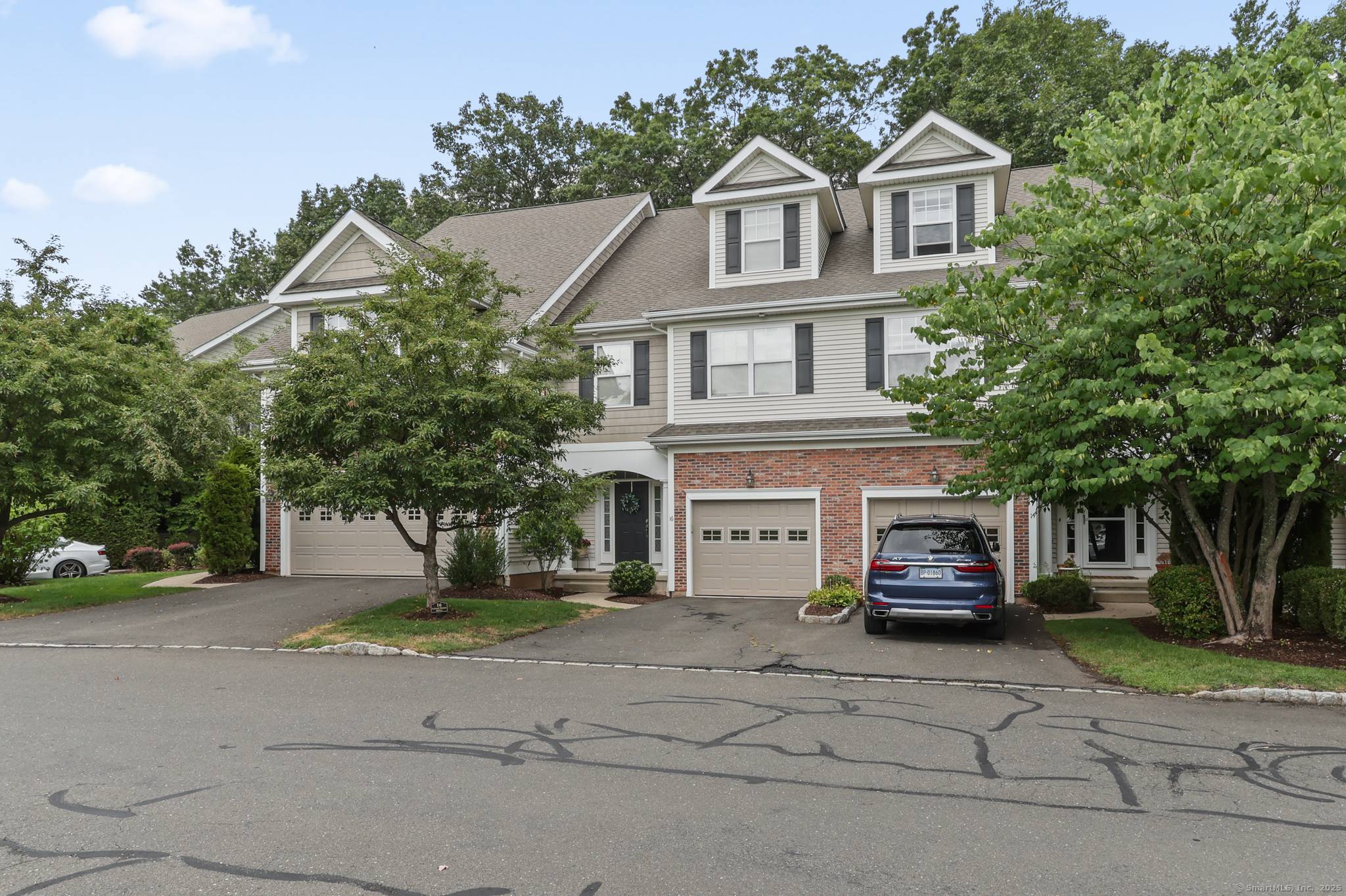 This stunning home at 16 Schoolhouse Dr in West Hartford showcases extensive upgrades and a thoughtfully designed layout.