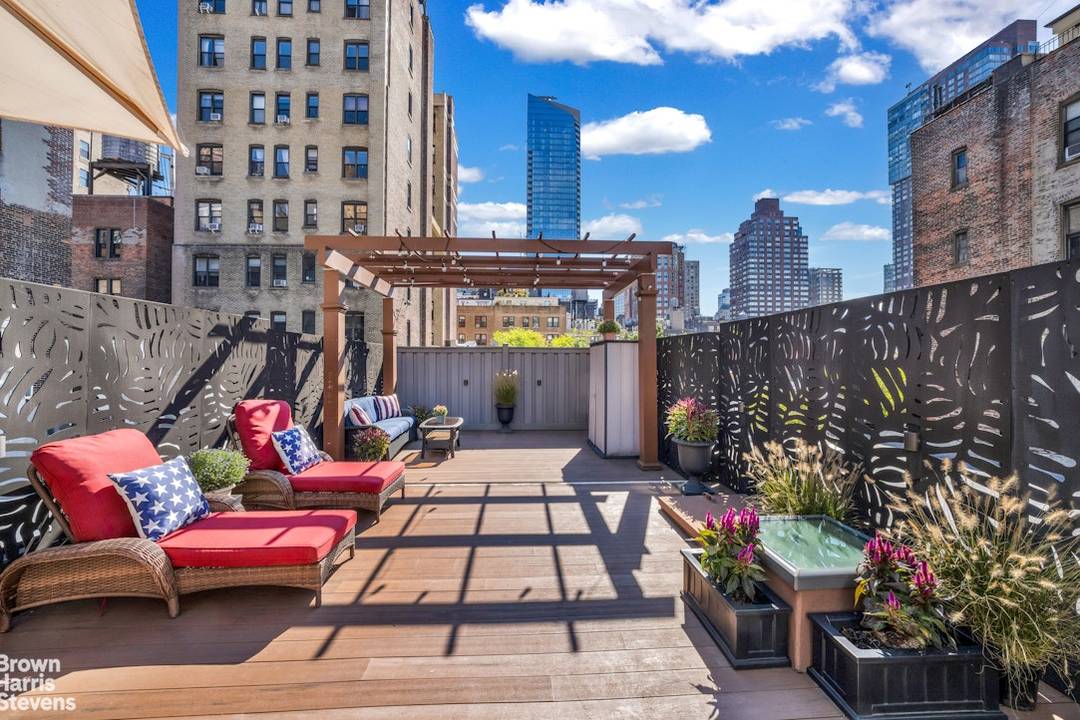 This absolutely beautiful floor through home is located on the top floor of a classic New York City brownstone.