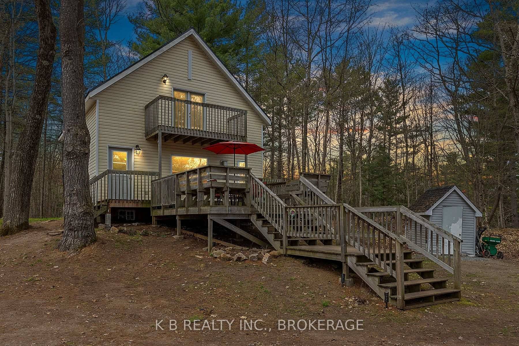 Enjoy this tranquil waterfront retreat nestled in the serene beauty of Knowlton Lake.