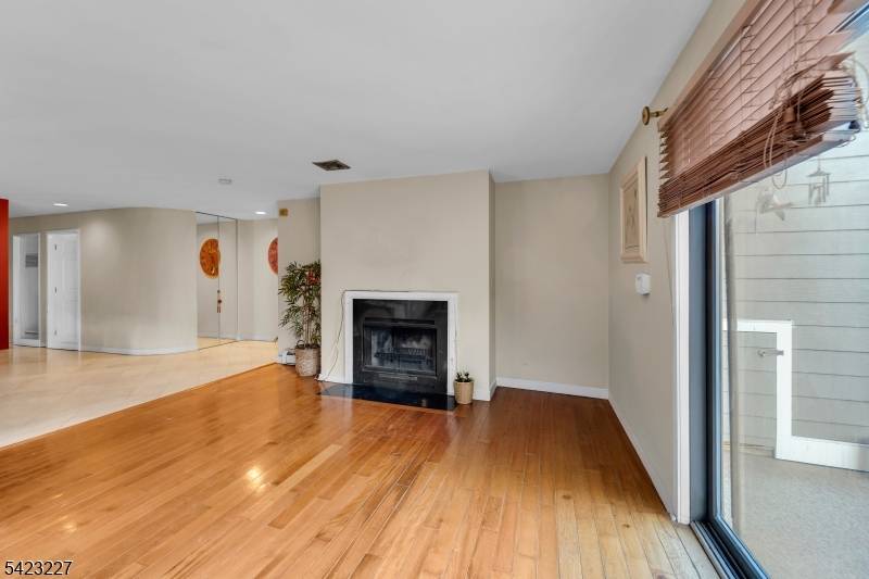 Welcome to 8C Cove Lane, a beautifully maintained residence nestled in the sought after waterfront community of Roc Harbor in North Bergen.