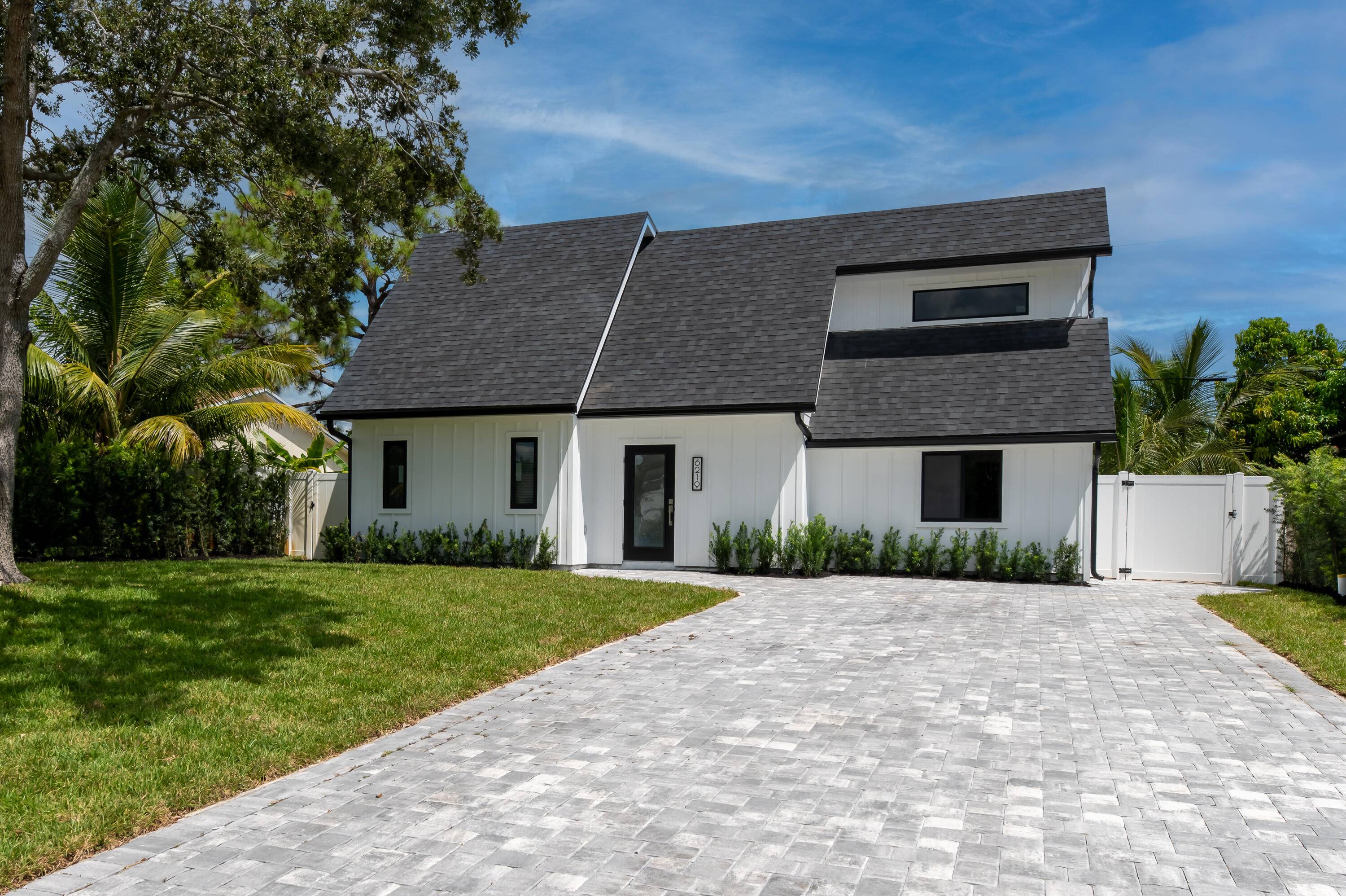 Stunning, fully renovated coastal farmhouse in Jupiter Heights !