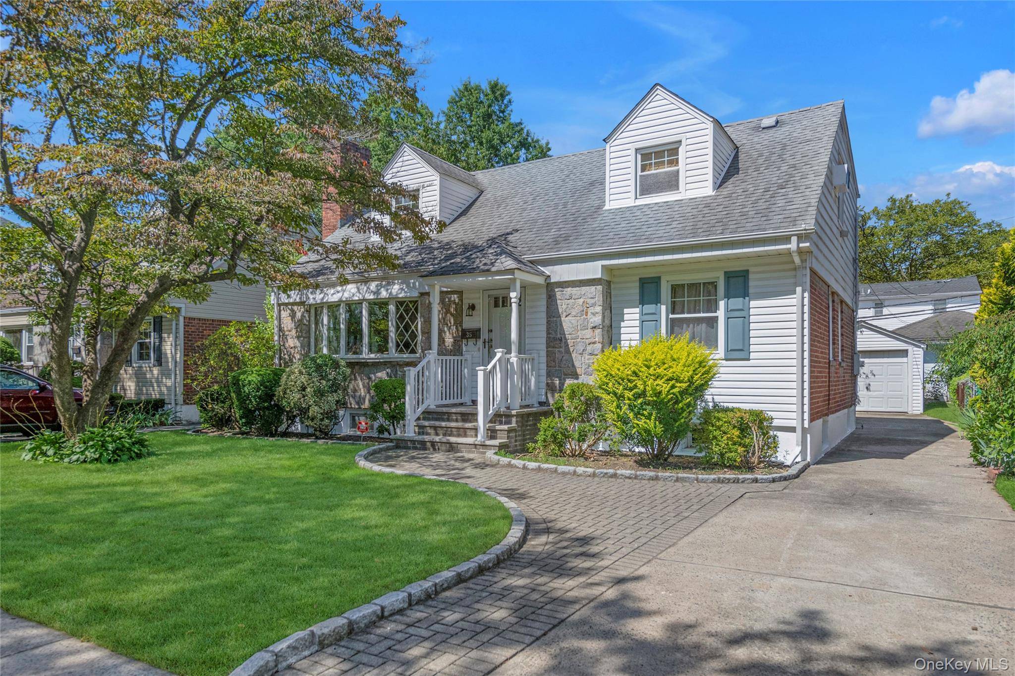 Beautifully maintained center hall wide line Cape with 3 bedrooms, 2 full baths, and approximately 1, 800 square feet of living space.