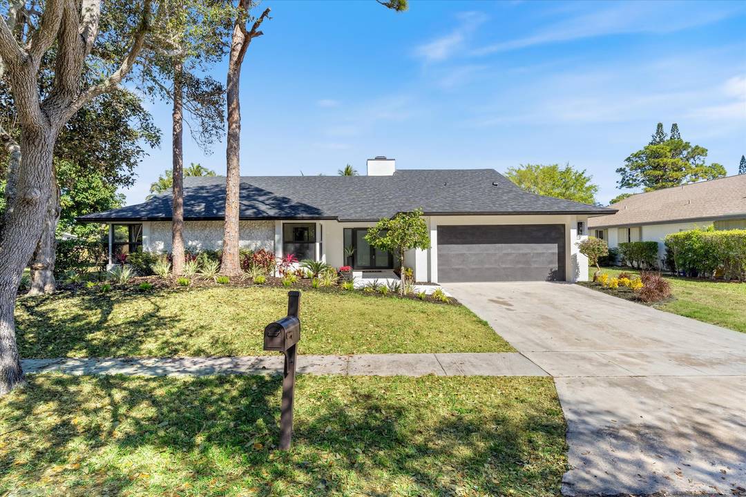 Be the first to enjoy this completely redesigned residence in the heart of central Boca Raton.