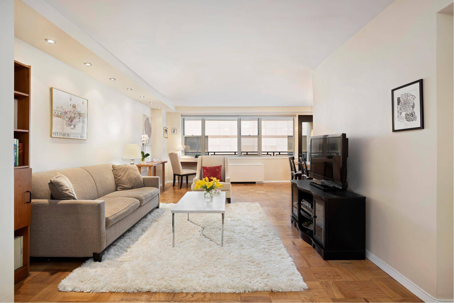 This is a very large, sunny, south facing two bedroom with a wonderful private balcony that looks out over Lincoln Center.