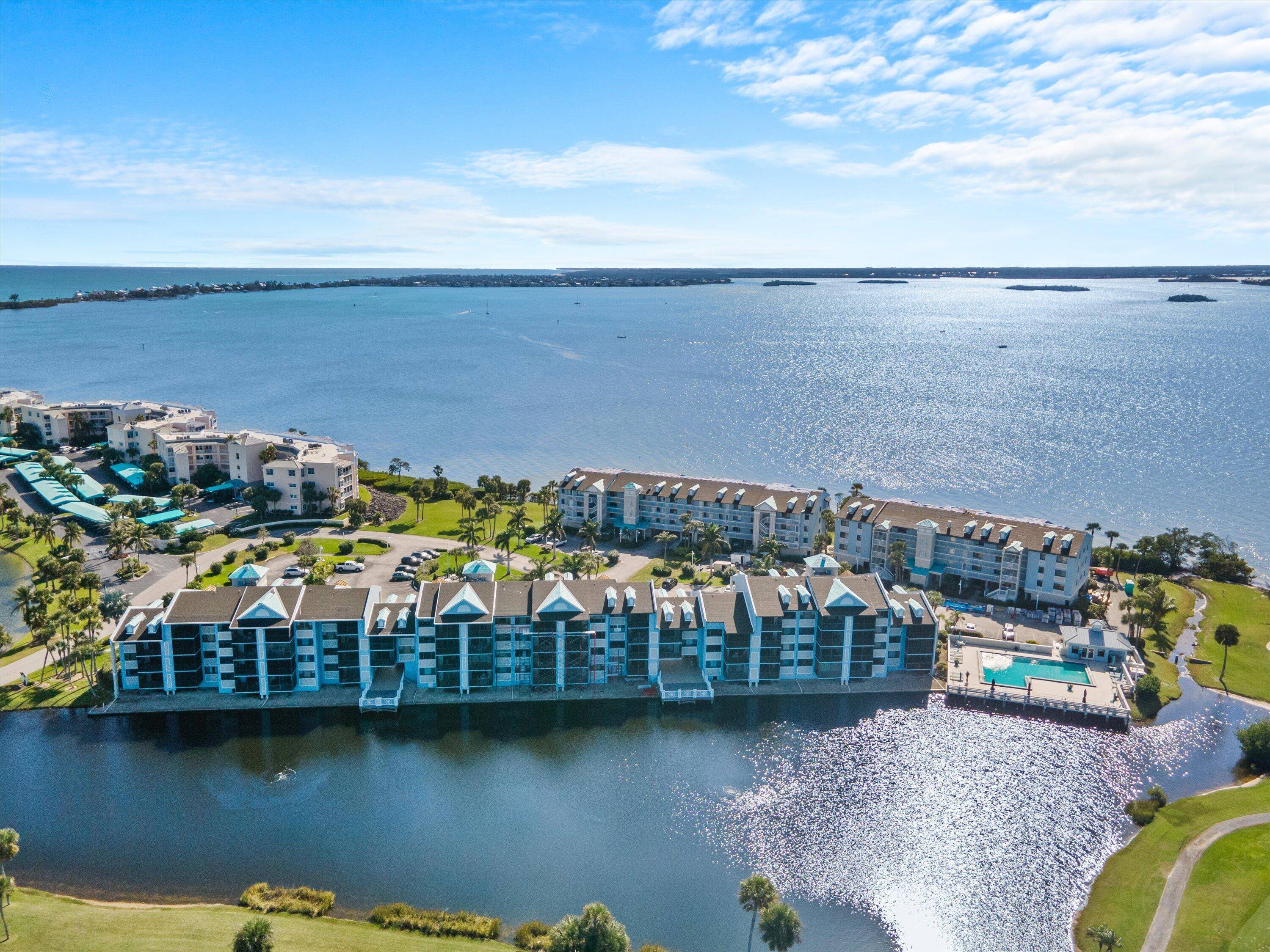 Wake up to stunning golf course and water views from this furnished 2BR 2BA sleeps 6 second floor condo in Indian River Plantation.