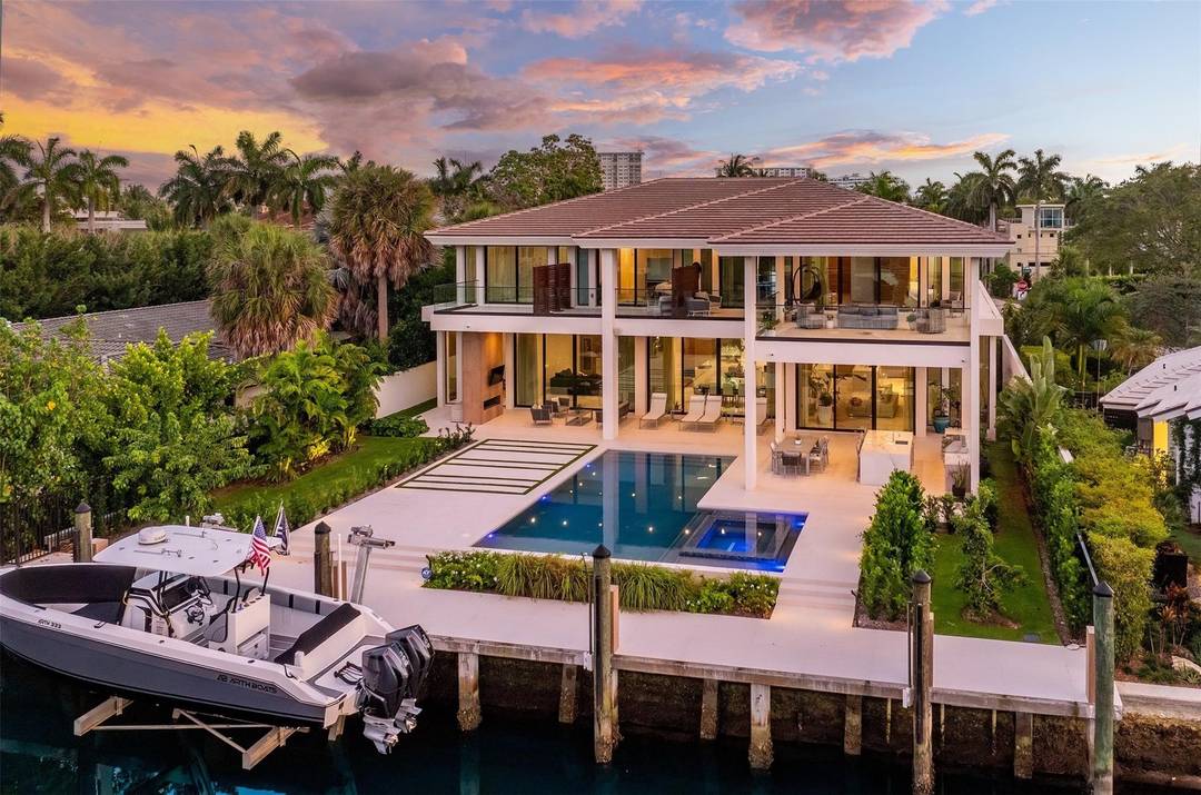 Custom, new construction contemporary estate in the gated Seven Isles enclave.
