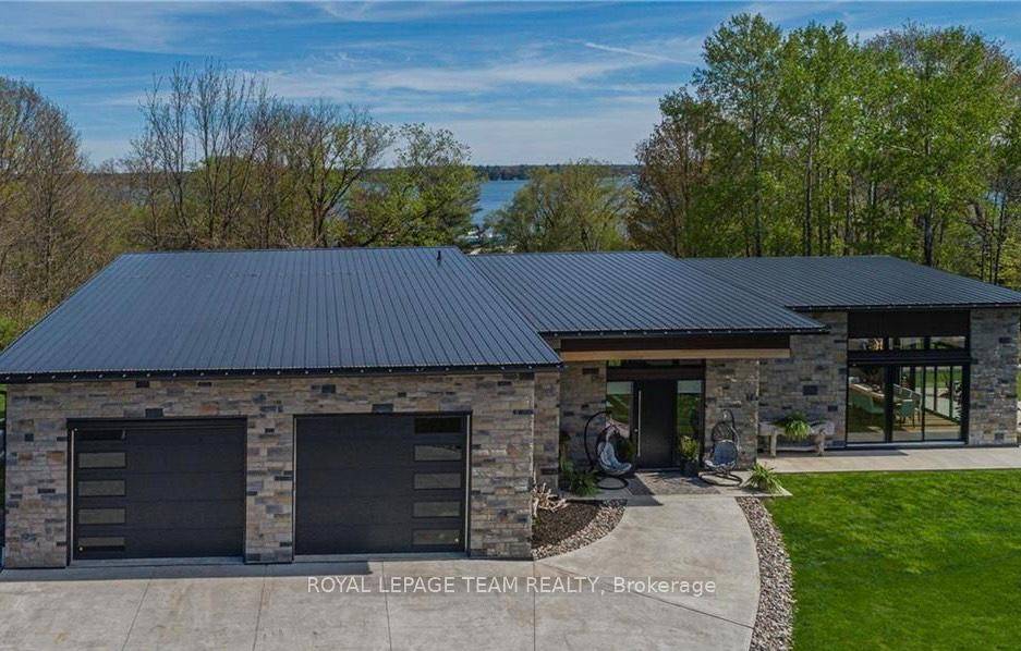Experience refined living in this stunning custom built executive home located in the heart of the 1000 Islands.