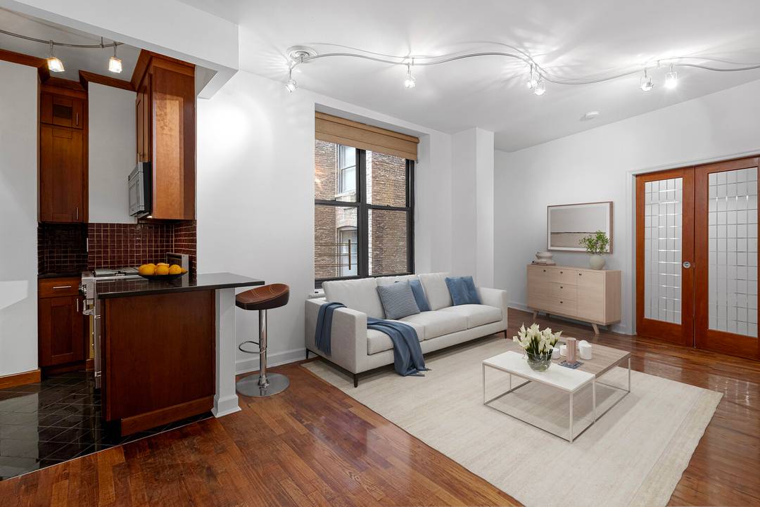 Live Just One Block Off Central Park !