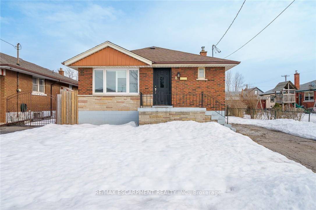 Completely Renovated, brick Bungalow with a separate 1 bedroom apartment.