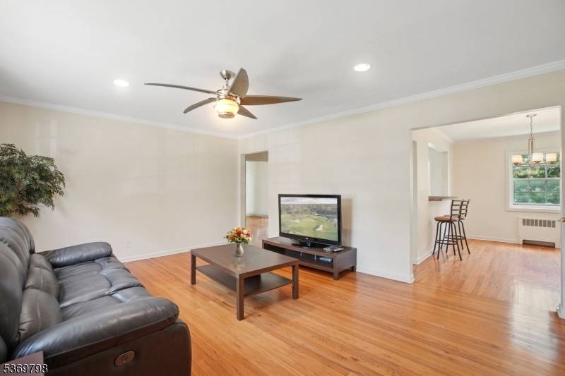 Nestled In The Highly Sought After, Park Like Setting Of Colfax Manor Sits This Bright And Airy First Level End Unit, Drenched In Natural Sunlight With Gleaming Hardwood Floors At ...