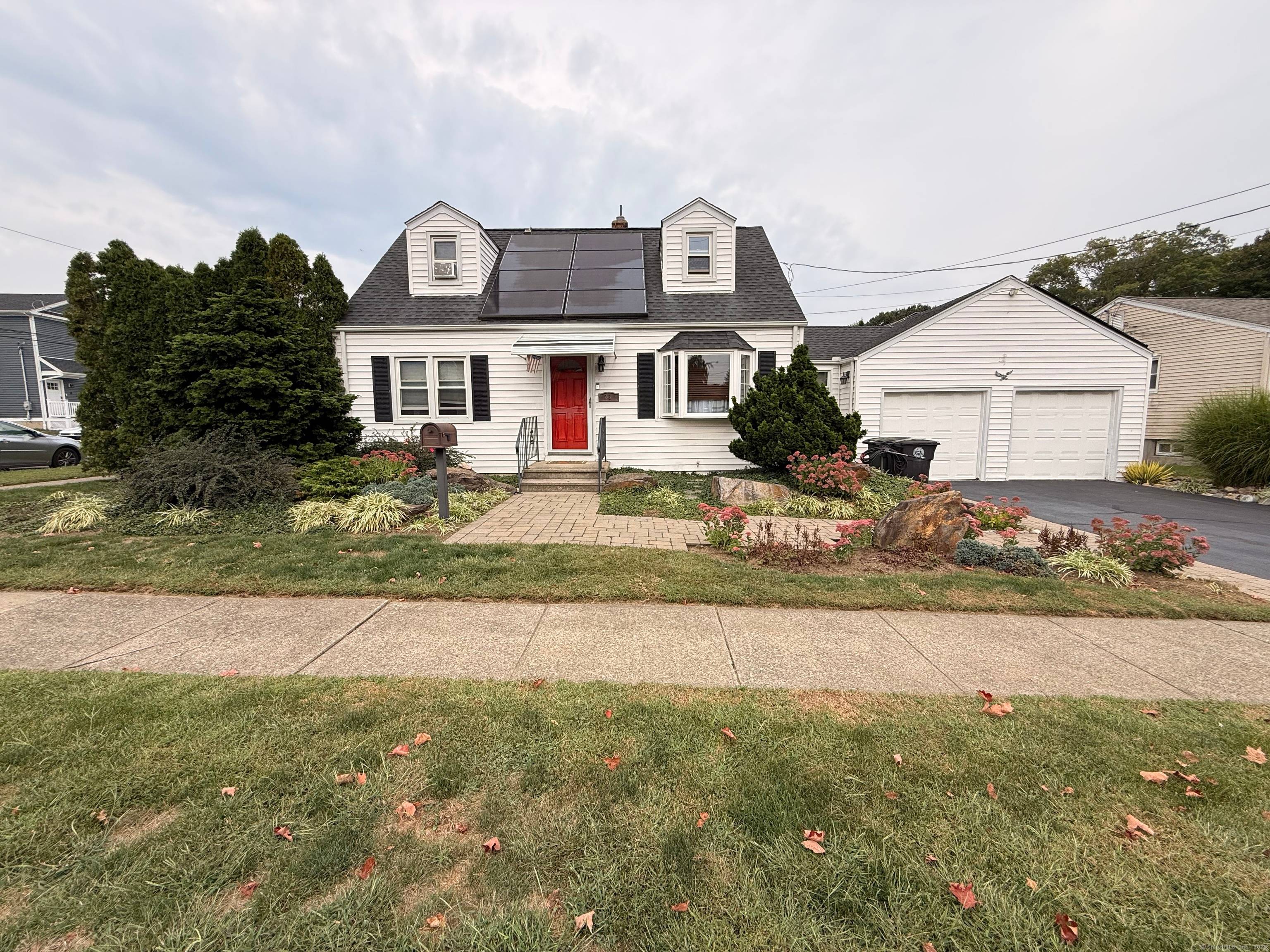 Welcome to this spacious 4 bedroom, 2 bath Cape style home located in desirable Milford, CT.