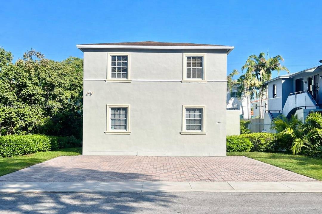 Well maintained fourplex featuring four spacious 2BD 1BA units with central A C and functional layouts ideal for long or short term rentals.