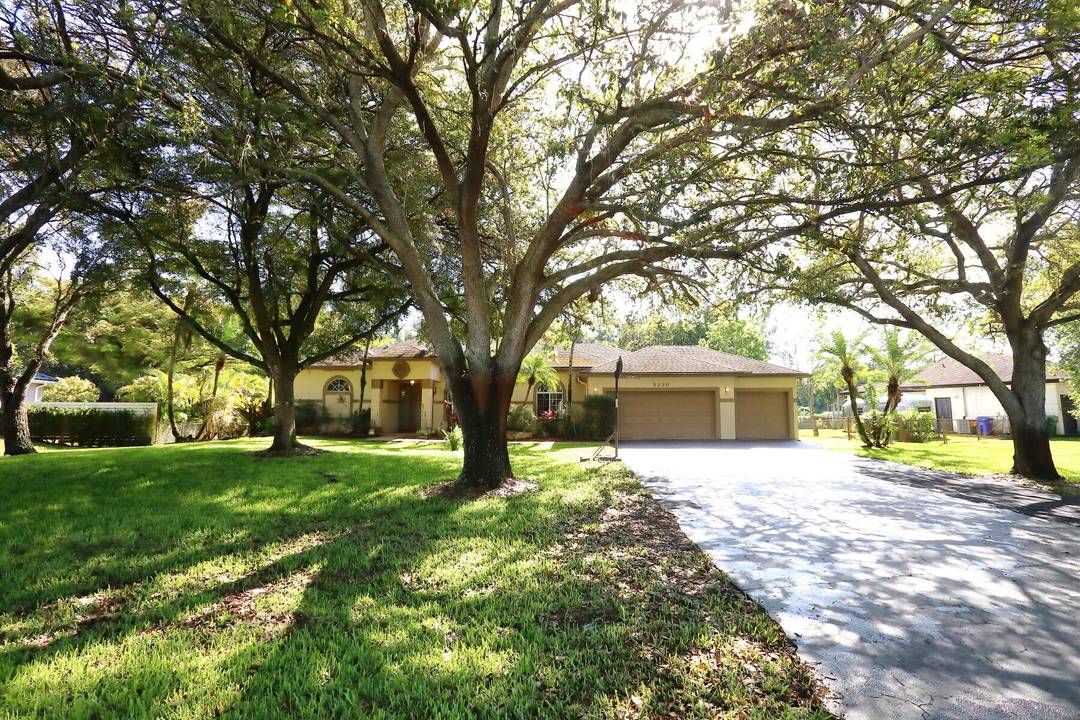 Beautifully maintained four bedroom pool home perfectly located in a very diserable area of Pembroke Pines sitting on a builder's acre.