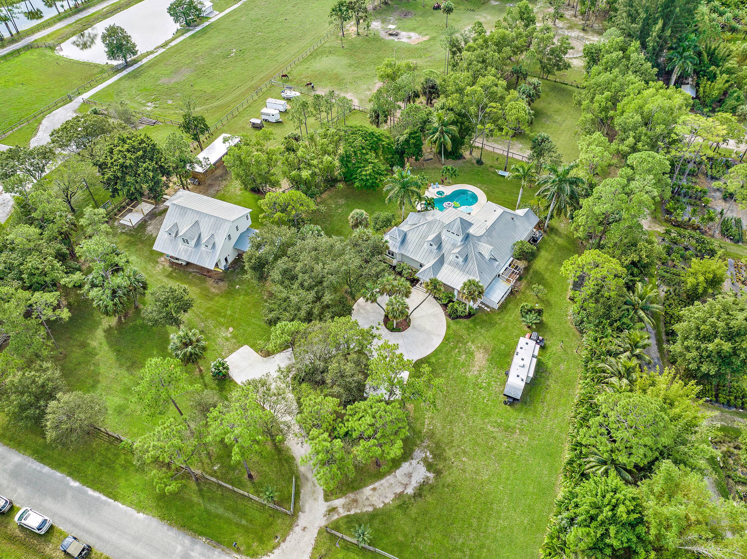 Gorgeous CBS home located in Jupiter Farms on 10.