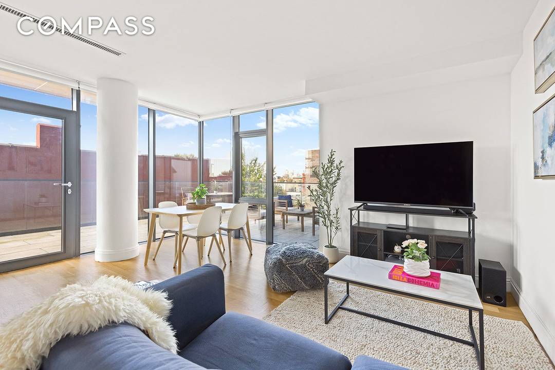 Luxury Indoor Outdoor Living with a Rare 640 SQFT Wraparound Terrace in Prime Park Slope Welcome to Residence 4D at 554 Fourth Avenue, a striking one bedroom, one bath home ...