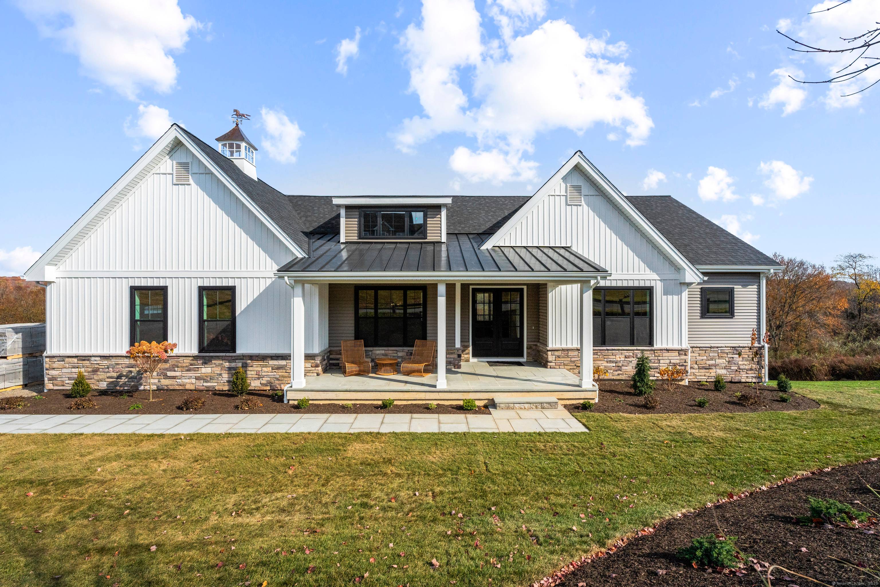 Welcome to luxury living in this stunning Modern Farmhouse Ranch, perfectly situated adjacent to Willow Creek Equestrian Farm.