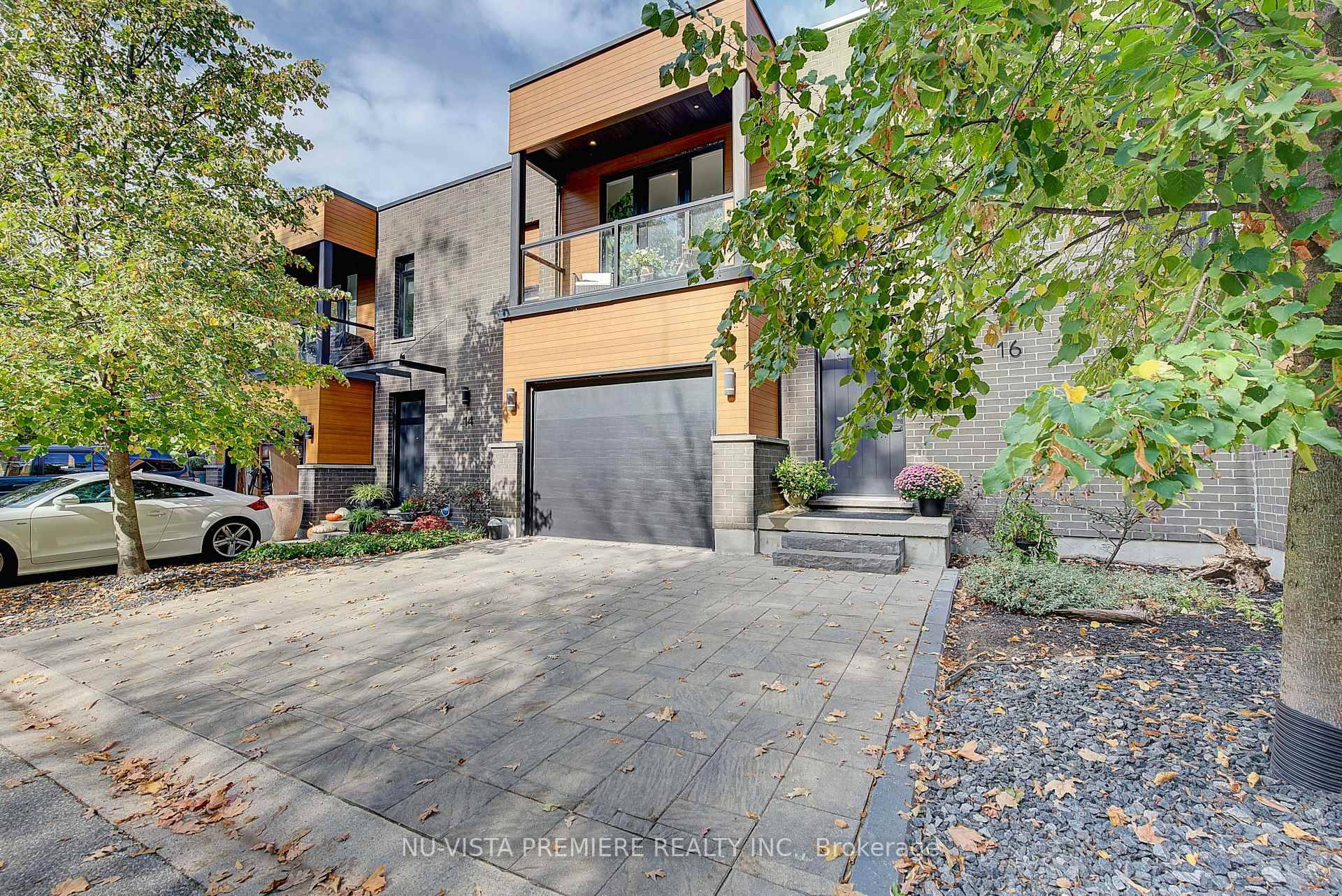 Discover this modern, upscale townhome nestled in a quiet Oakridge Riverside enclave of just nine exclusive residences where privacy meets refined design.