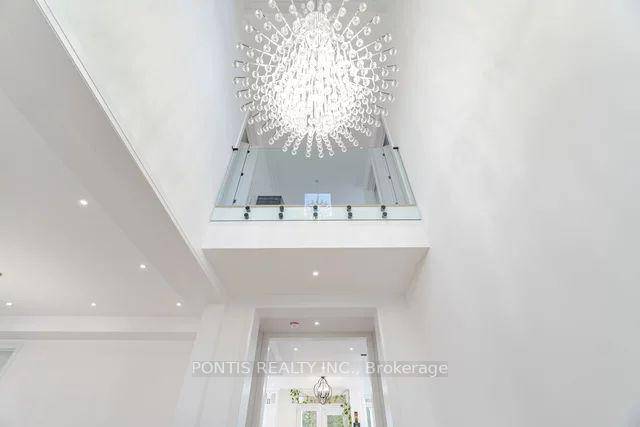 Welcome to this custom built masterpiece, offering over 5, 000 sqft of luxurious living space with 4 2 bedrooms and 6.