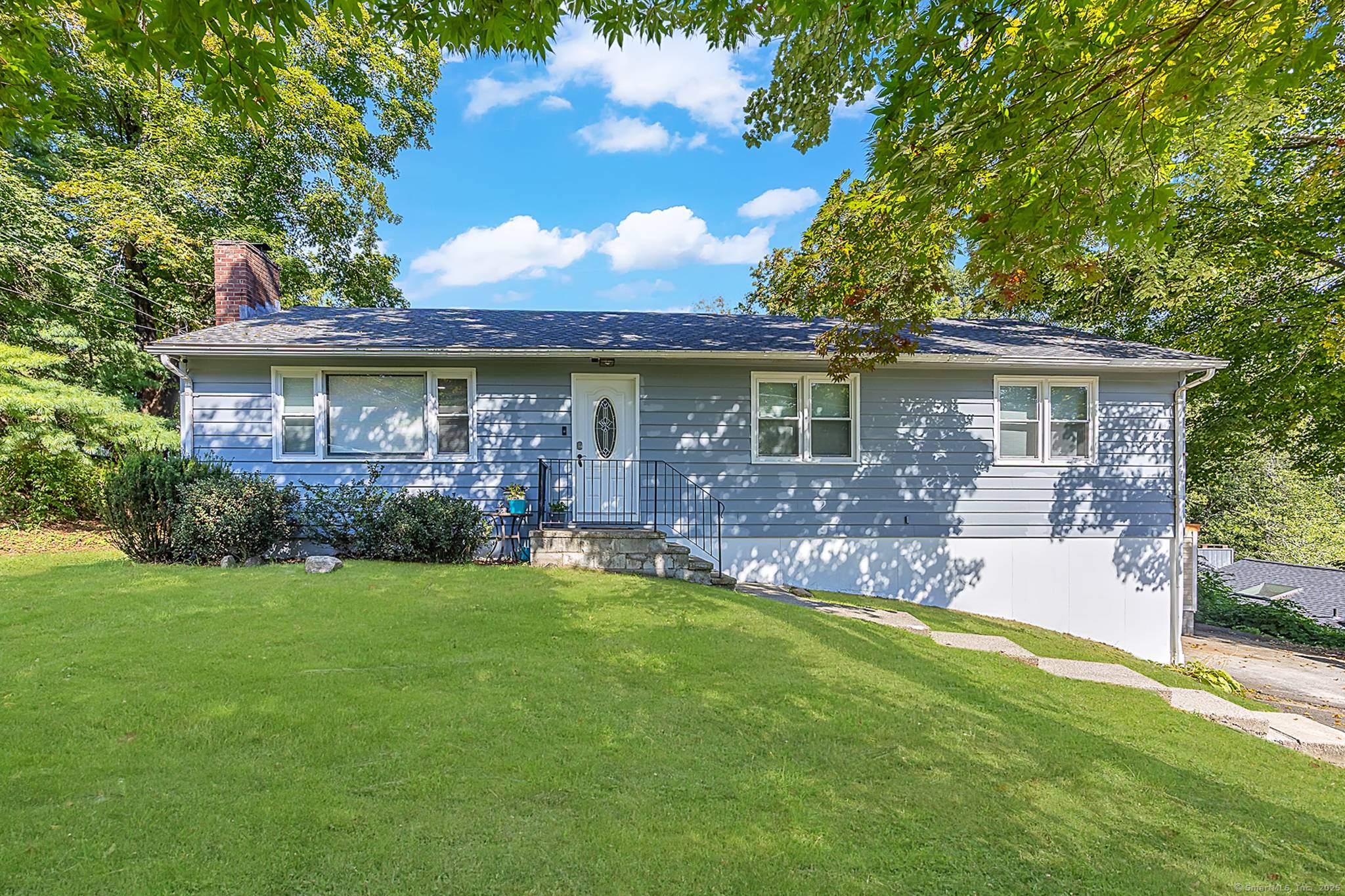 Welcome home to this fully renovated five bedroom, bright ranch in the lovely Candlewood Lake community.