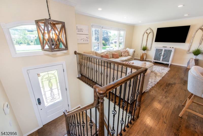 Welcome to this beautifully updated bi level home situated on a large property with picture perfect curb appeal and conveniently located within walking distance to Adlai E.
