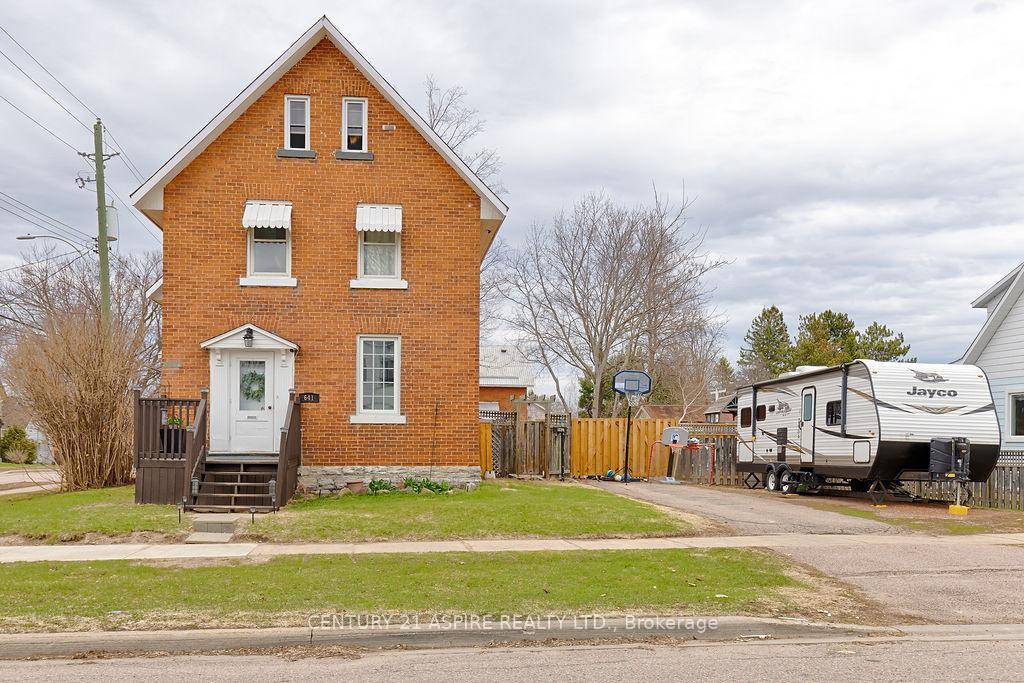 Step into timeless charm with this stunning five bedroom red brick century home, full of character and endless possibilities.