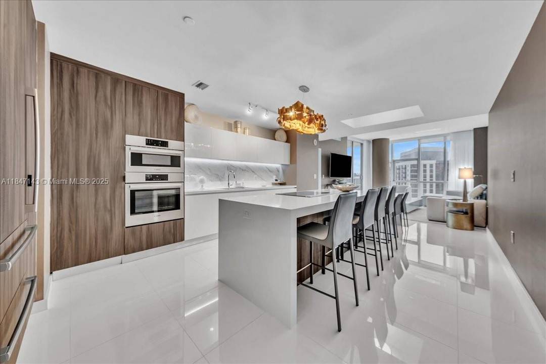 Absolutely stunning corner residence in perfect condition with direct ocean views at Paramount One World Center.