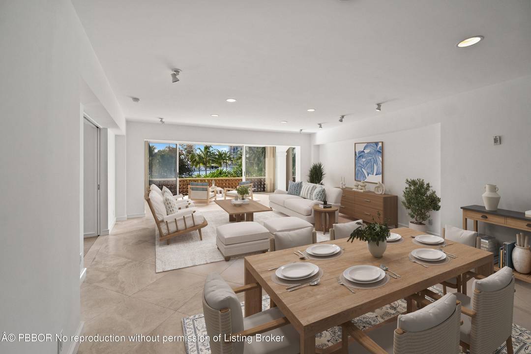 Spacious 2nd floor condo featuring two oversized bedrooms, two baths, and a bright sunroom that expands the open living area.