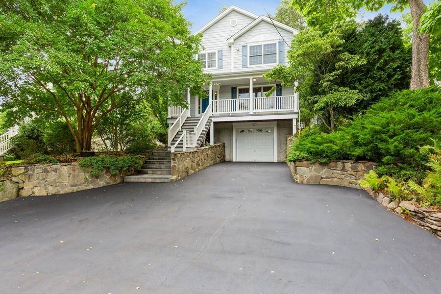 Welcome to 24 Midland Avenue, we believe to be the only Hurtado built custom home in the Village of Port Jefferson.