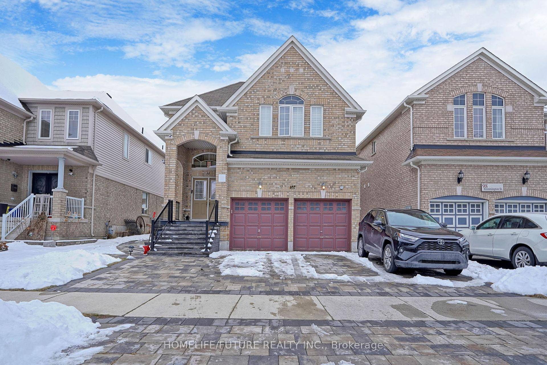 This Stunning Brick Detached Home Boasts An Inviting Grand Foyer And A Double Door Entrance.