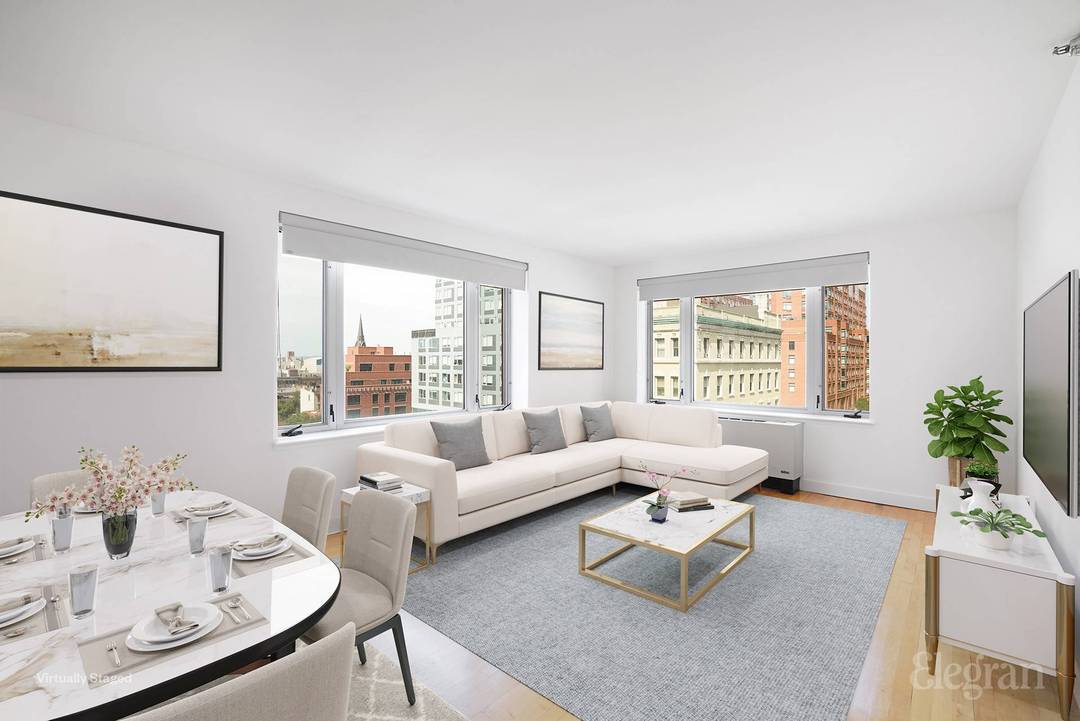 LIGHT, SPACE, COMFORT, AND BUILDING AMENITIES AT A REDUCED MARKET RENT !