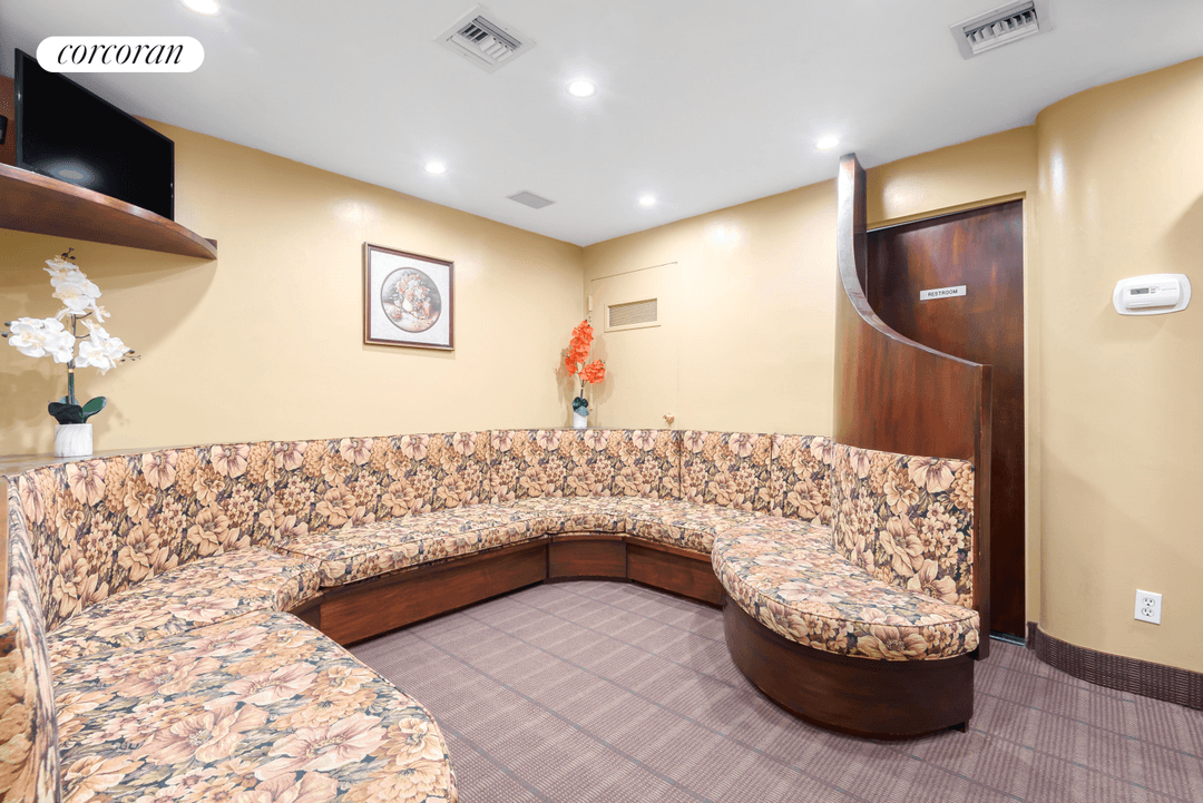 Fifth Avenue 69th Street with Central Park across the street.