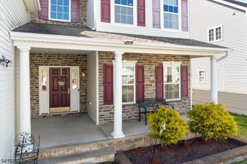 Built in 2015, this east facing, stone front Mercer model in desirable Summerfields is packed with major recent upgrades including owned solar panels 9.