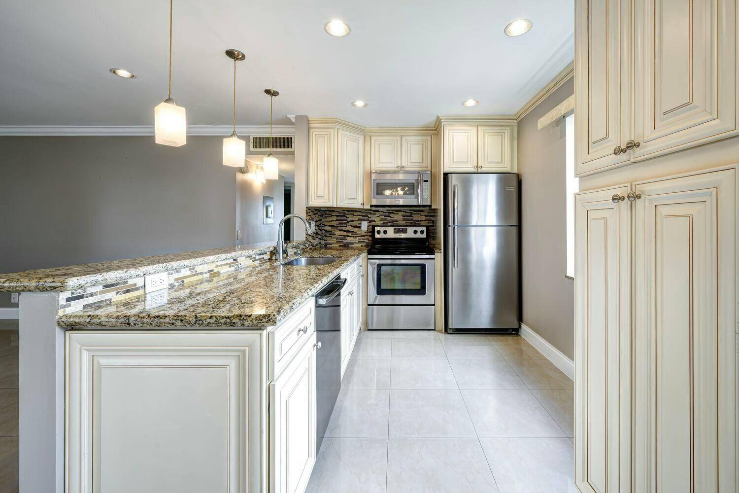 Discover this fully renovated, second floor corner condo in Delray Beach's prestigious 55 community, Kings Point.