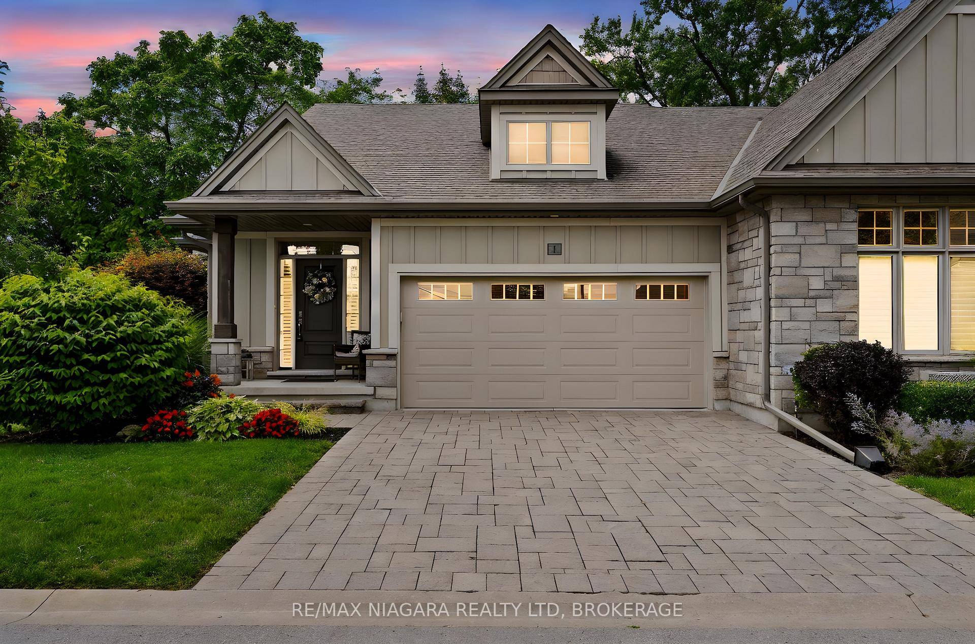 Welcome to 1 Lena Common an elegant end unit bungalow townhome in St.