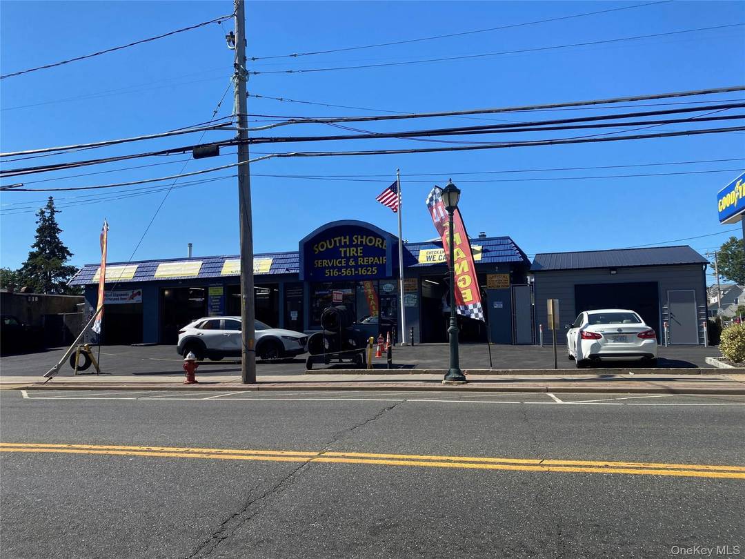 Fully renovated modern automotive repair building, with comfortable office waiting area.