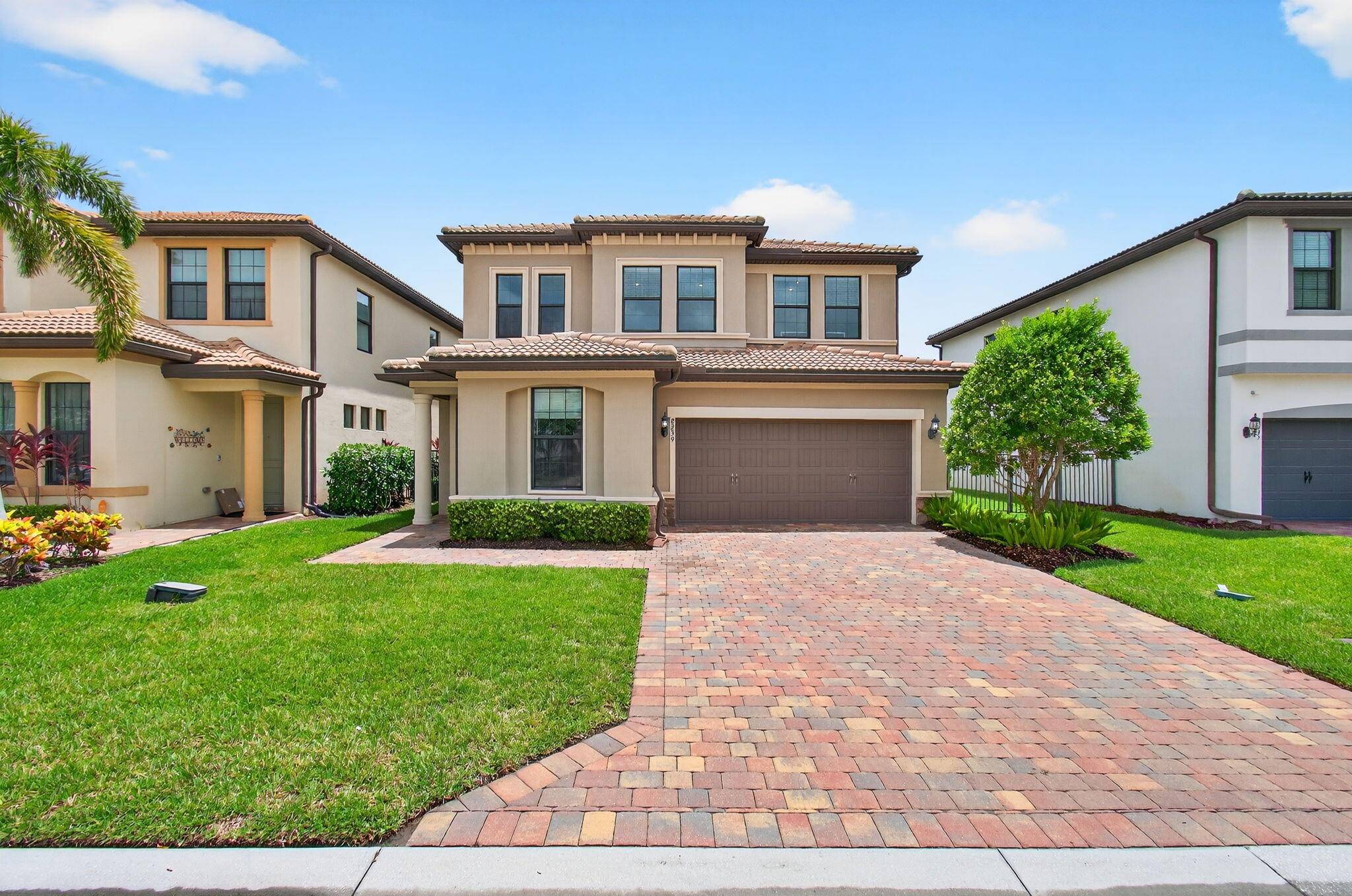 Welcome to this beautifully appointed 2018 built single family home located in the prestigious Fields at Gulf Stream Polo.