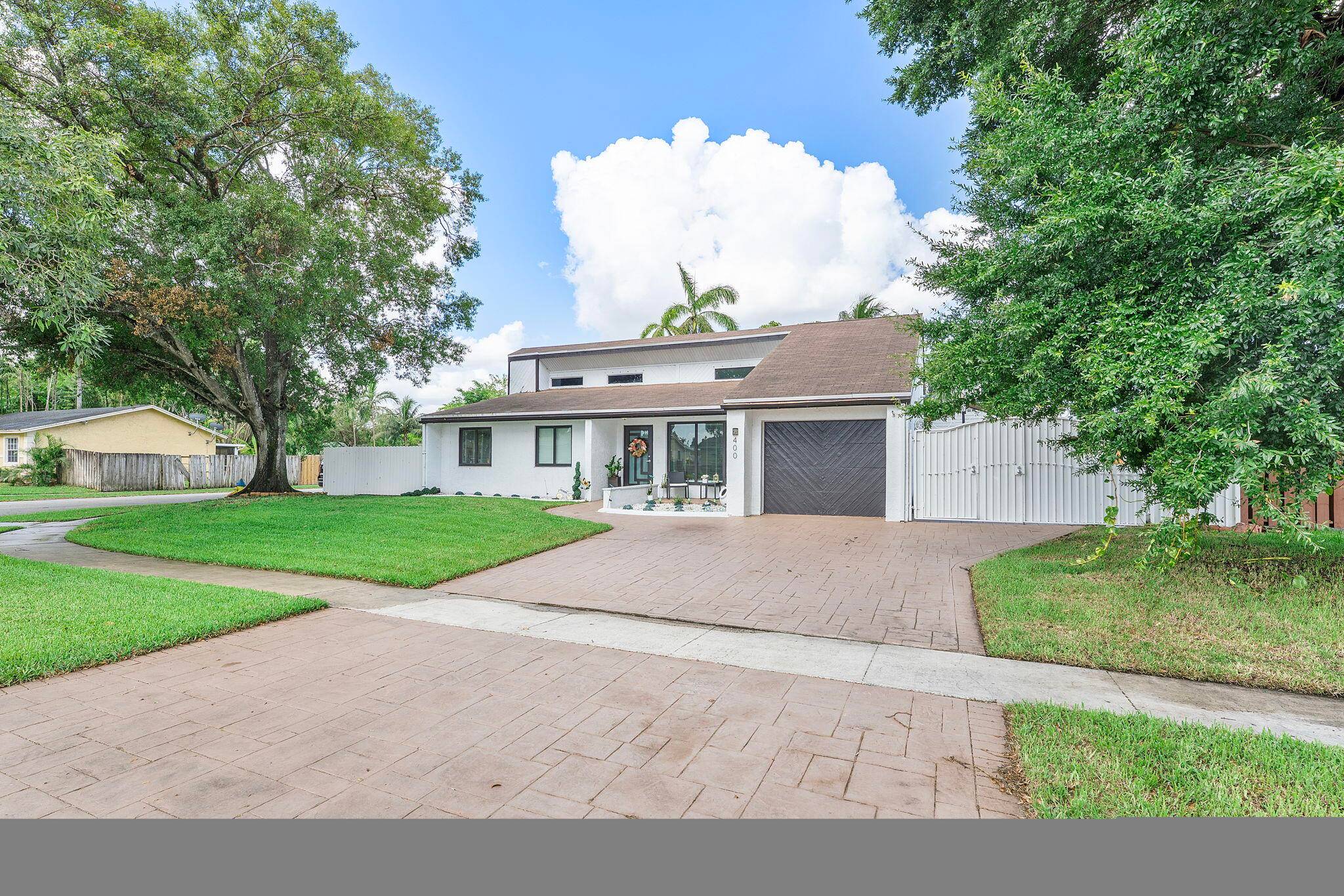 WATERFRONT POOL CORNER LOT IN LAW SUITE LAKE DECK NO HOAThis UNIQUE PROPERTY has it all and offers the perfect blend of comfort, versatility, and location, ideal as an AIRBNB ...
