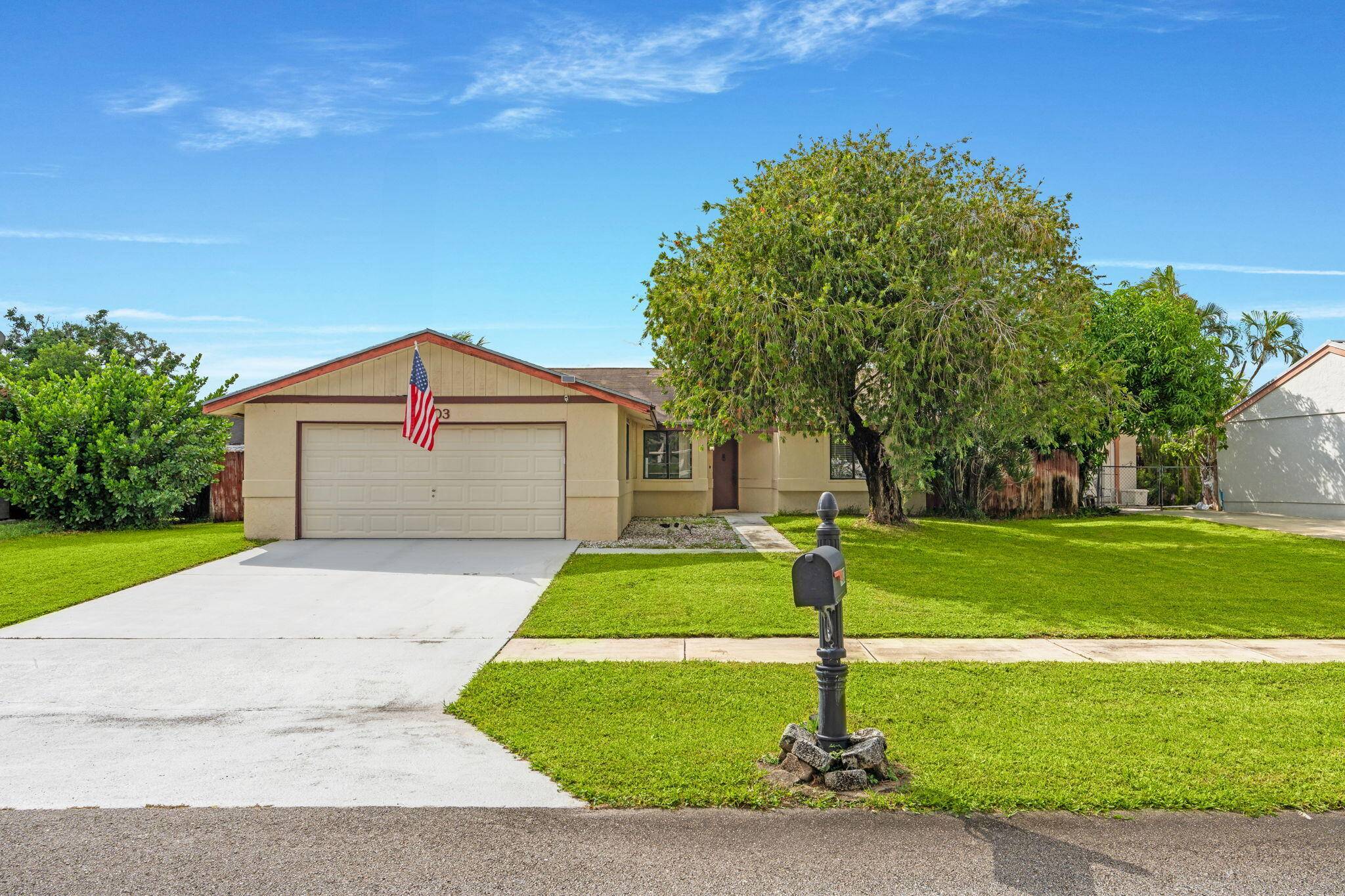 Welcome to 1403 Donwoods Ln, your Royal Palm Beach retreat situated in the great neighborhood of Counterpoint Estates.