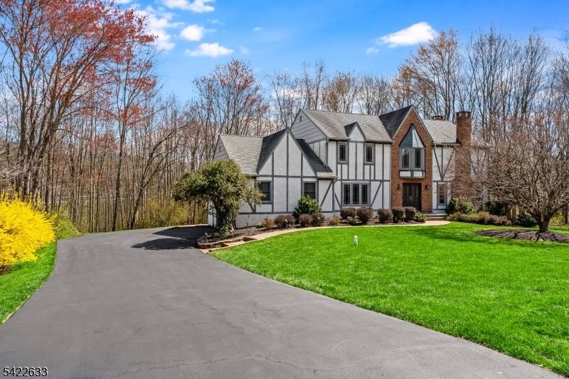 This Tudor style center hall Colonial is set on the south side of town with easy access to downtown and Route 287 and is exceptionally well maintained.