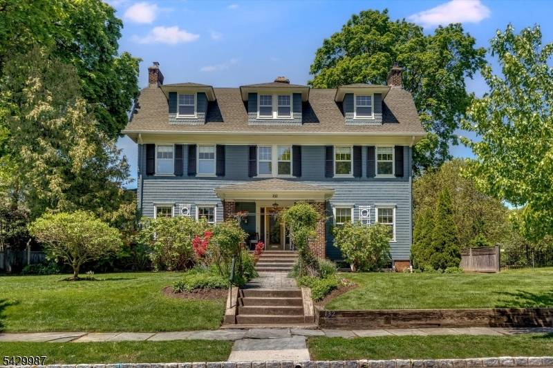 Set on a coveted, tree lined street in prime Montclair location.