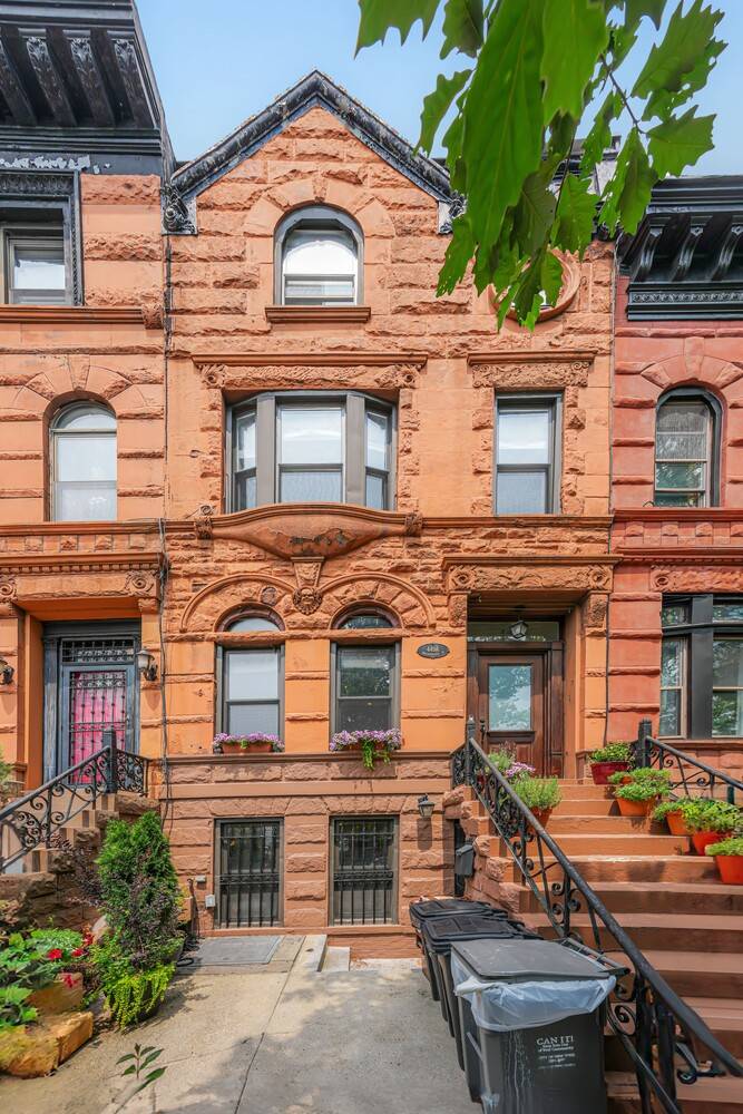 ENJOY HISTORIC TOWNHOME LIVING IN THIS GUT RENOVATED UPPER TRIPLEX W PRIVATE BACKYARD AND TERRACE.