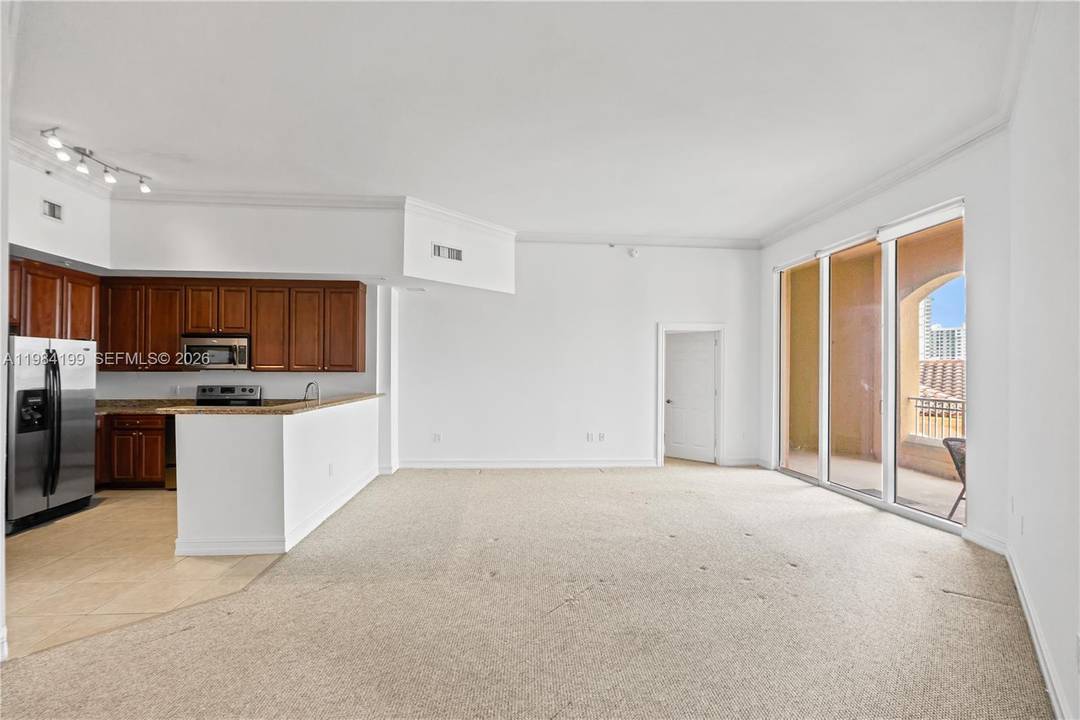 Spacious 2 bedroom, 2. 5 bath unit in Alaqua overlooking the beautifully landscaped courtyard and pool area and the Aventura Skyline.