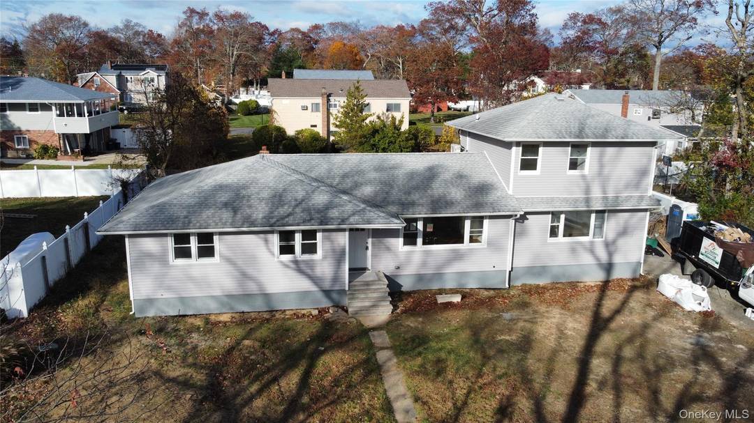 Welcome to this stunning, newly renovated split level home located in the heart of West Babylon, NY, perfect for a growing family.