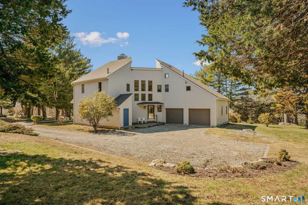 Custom designed one owner Contemporary home positioned on a 2.