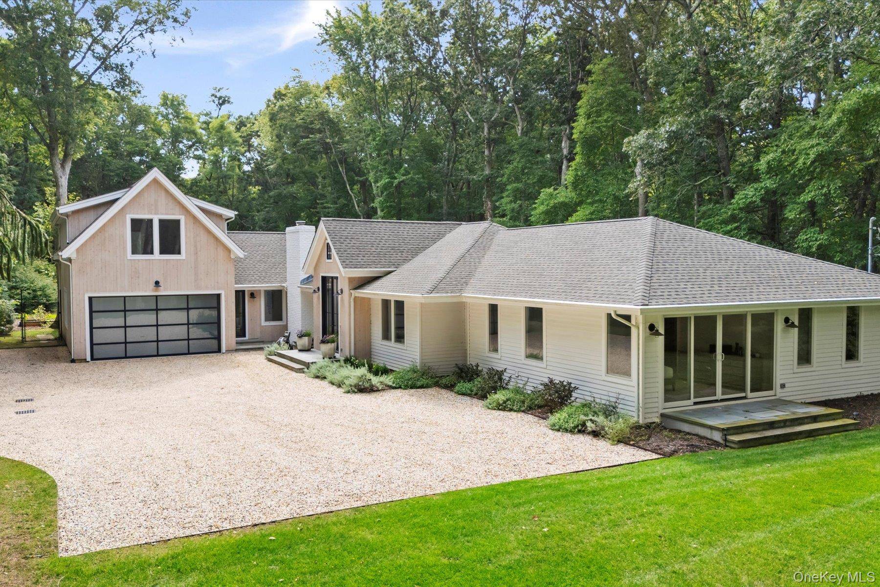 State Of The Art Modern Retreat in a Private Setting Tucked away in a serene and secluded corner of the Indian Neck Lane Community of Peconic, this stunning, state of ...