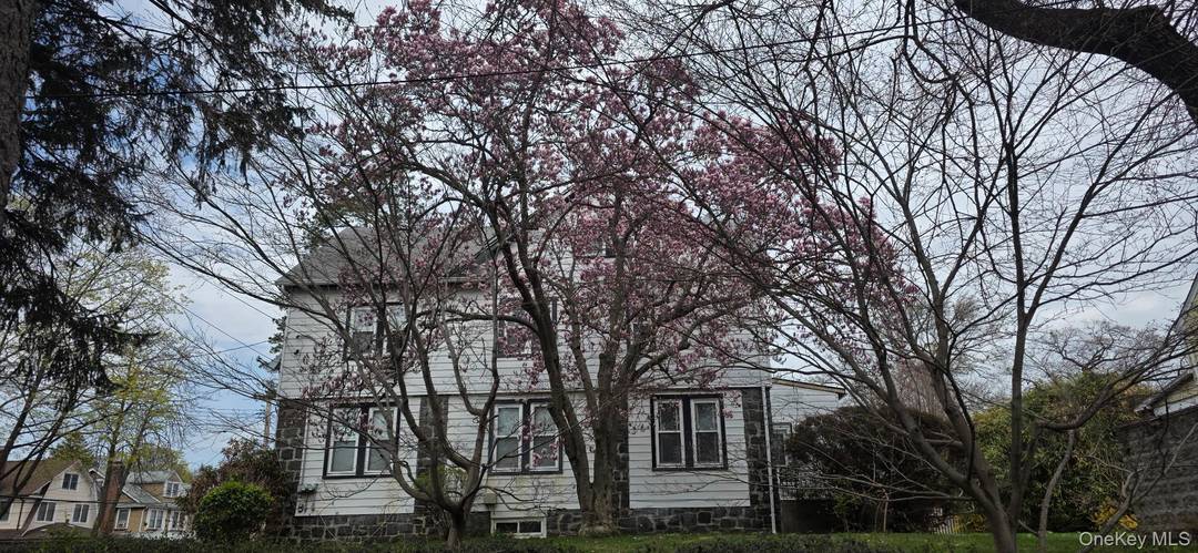 This Bayside Two Family Corner Property Presents an Exceptional Opportunity for Home Buyers and Investors Seeking a Desirable Location with Promising Potential.